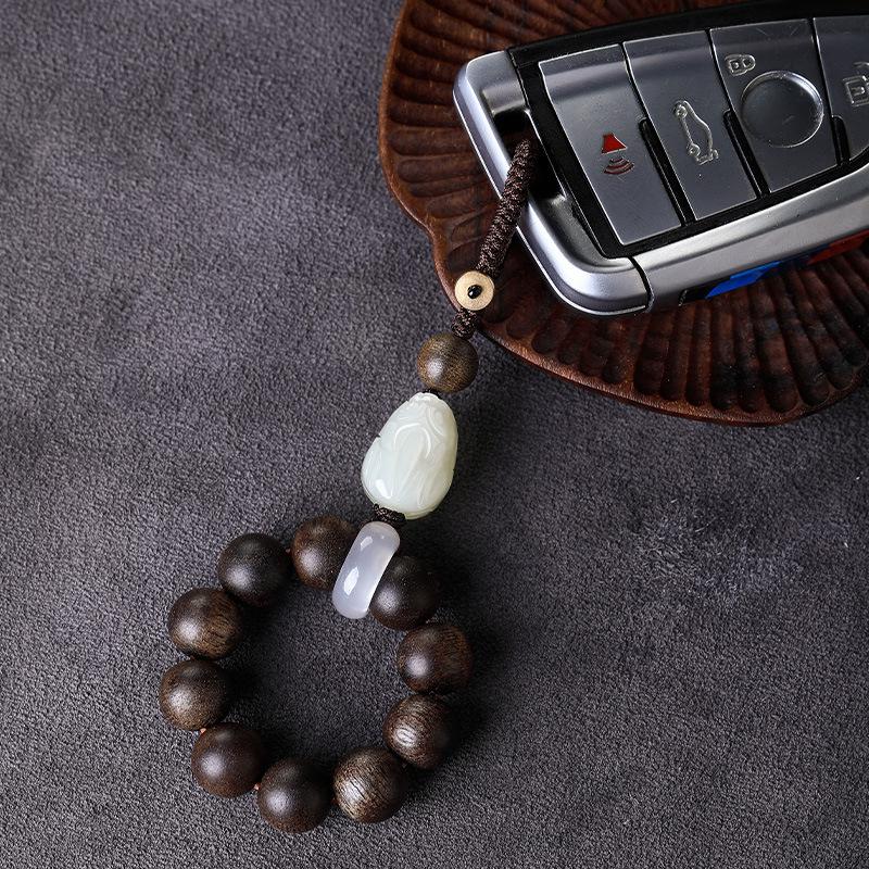 Vietnam Nha Trang agarwood semi-submersible car keychain pendant, natural Hetian jade Pixiu car interior decoration accessory
