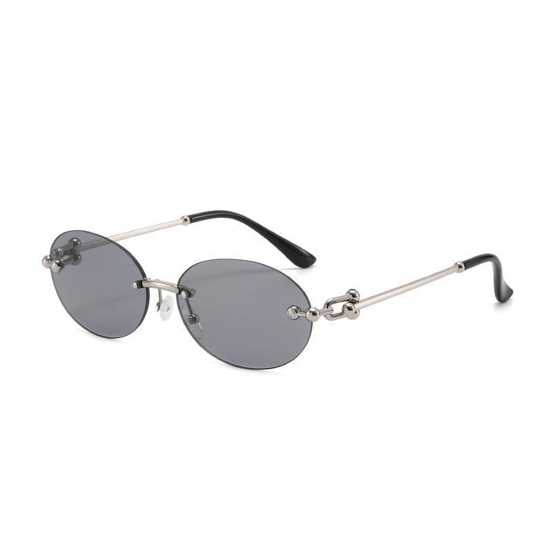 2025 Trendy Retro Rimless Metal Sunglasses: European & American Style UV Protection for Women