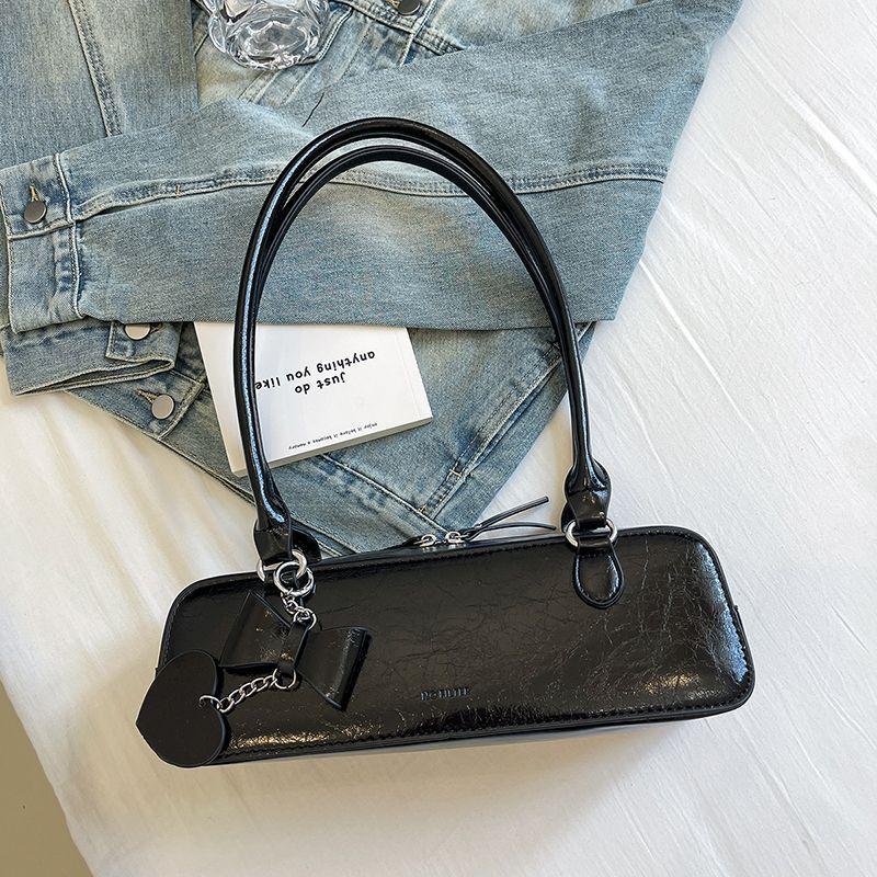 Korean niche design new high-end texture large-capacity baguette bag sweet and cool Spice Girl shoulder bag handbag