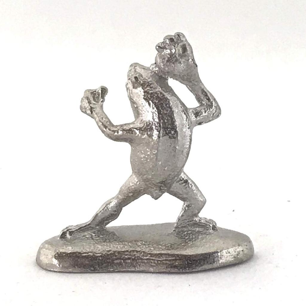 A miniature tin frog from the Choju Jinbutsu Giga perfect for your dry landscape painting, garden.