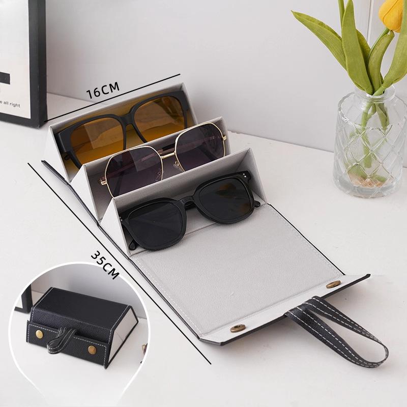 

Кожаный многосекционный чехол для очков Большой вместимости Портативный Устойчивый к давлению Складной чехол для очков Коробка для хранения Three squares чёрный