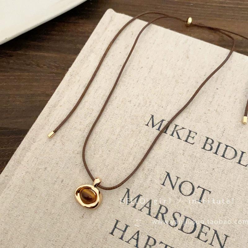 

Retro Maillard Color Tiger s Eye Stone Gold Color Irregular Geometric Circle Pendant Leather Rope Necklace for Women Zircon