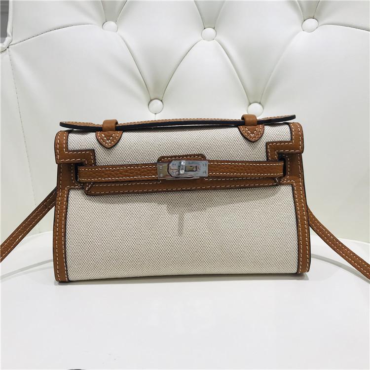 Nowej generacji płócienna torebka kopertówka ze skóry krowiej damska torba na ramię ukośny mała torba torba startowa