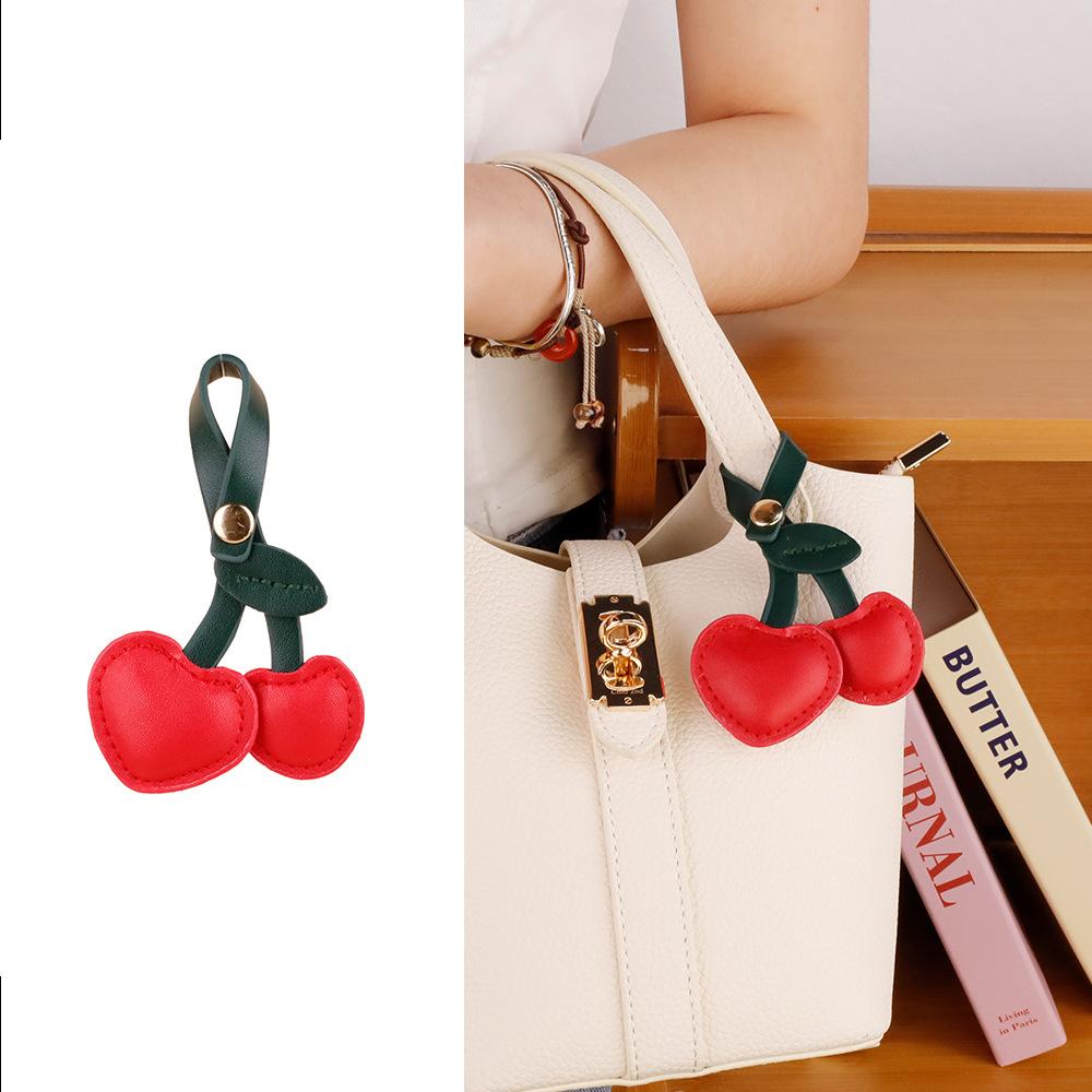 

Bag Ornament Cute Peach Heart Cherry Fruit Cherry Car pu leather Red Pink Love Versatile Bag Pendant Key Chains For Women червоний