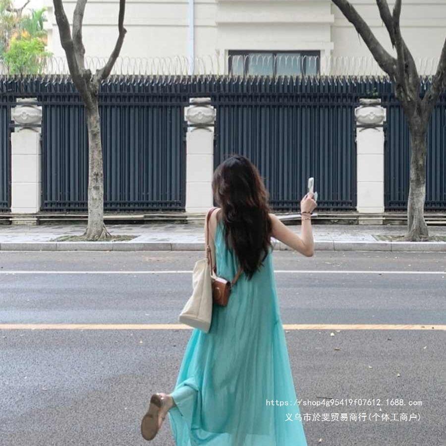 French hollow suspender dress women's summer seaside vacation wind beach skirt pleated lazy relaxation long skirt