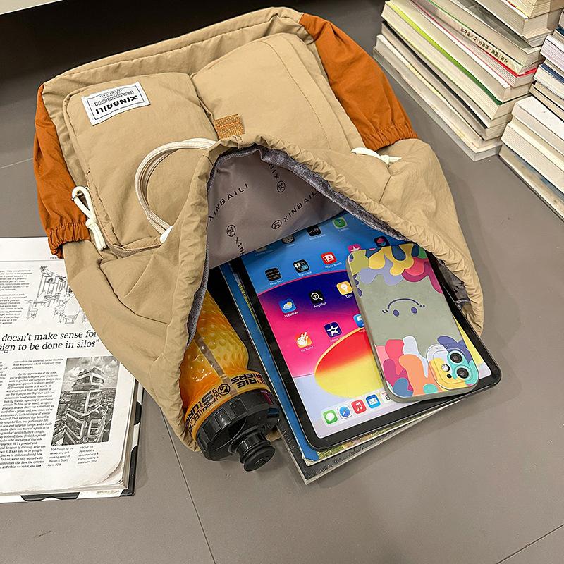 Outdoor japanische Farbkombination Rucksack große Kapazität Mehrfachtaschen Schultasche einfacher lässiger Rucksack Spritzwassergeschützt und verschleißfest