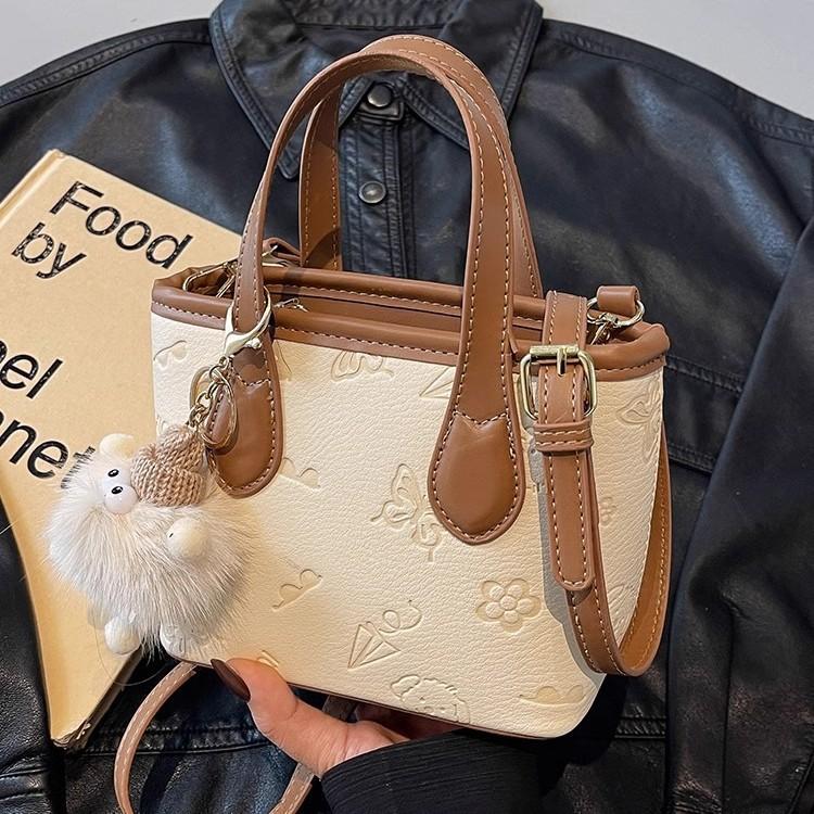 Pink vegetable basket bag women's 2025 new light luxury niche design advanced texture super fire messenger bucket bag