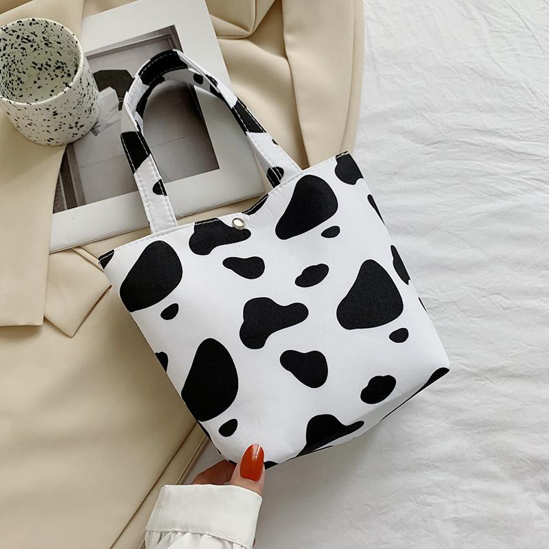 

Простая женская сумка-тоут 2025 лето новая мода ретро сумка с принтом коровы леопардовым принтом полосатая подмышечная сумка на плечо