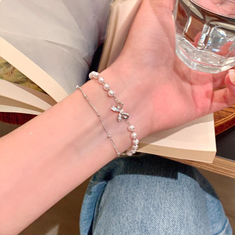 Elegant Silver Bow Double-Layer Pearl Bracelet - High-End, Versatile, Stackable Fashion Accessory