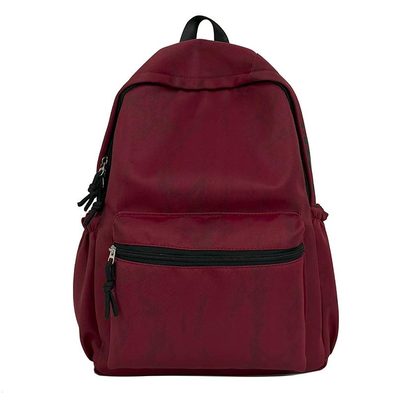 Schoolbag1011 new large-capacity backpack schoolbag, male and female junior high school students backpack, casual simple and lightweight college