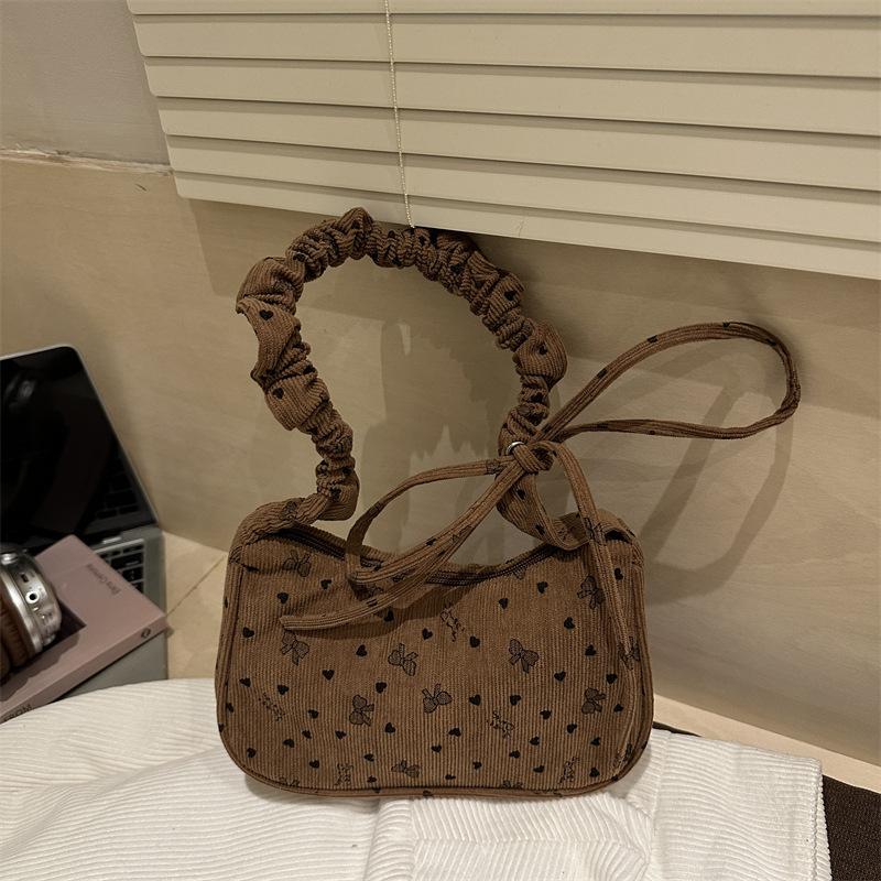 

Broken flower dumpling bag 2025 women s new autumn shoulder Korean large capacity ins commuter messenger bag armpit bag коричневый