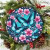 Round Tin Metal Sign with Blue Butterflies and Pink Cherry Blossoms Wall Decor