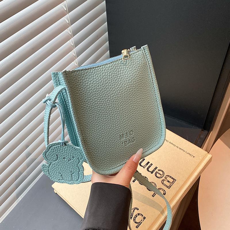 Korean version of simple vegetable basket bag women's 2025 spring and summer new fashionable versatile high-end sense portable shoulder messenger bag