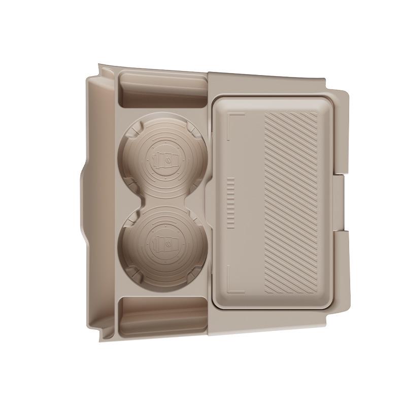 Compatible with 26 Geely Xingyue L models, this dustproof silicone storage box fits under the center console for convenient storage.