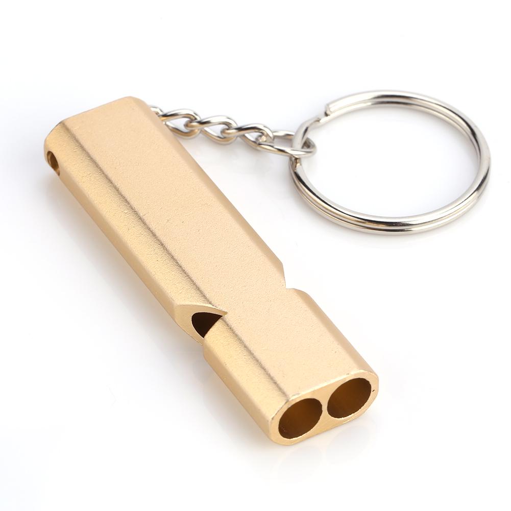 

Портативный высокочастотный громкий аварийный свисток с двумя отверстиями и брелоком (золотой) золотой