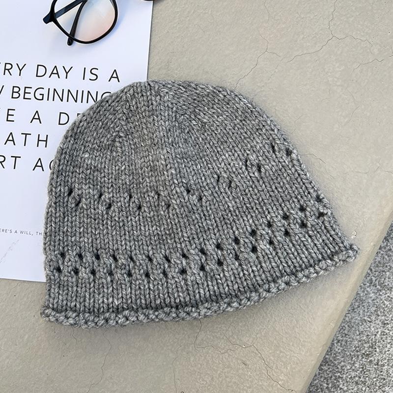 The New Woolen Pullover Hat Is Feminine  Warm and Ear Protecting. The Woolen Knitted Hat Makes The Face Look Smaller and Is A Retro Cold Hat