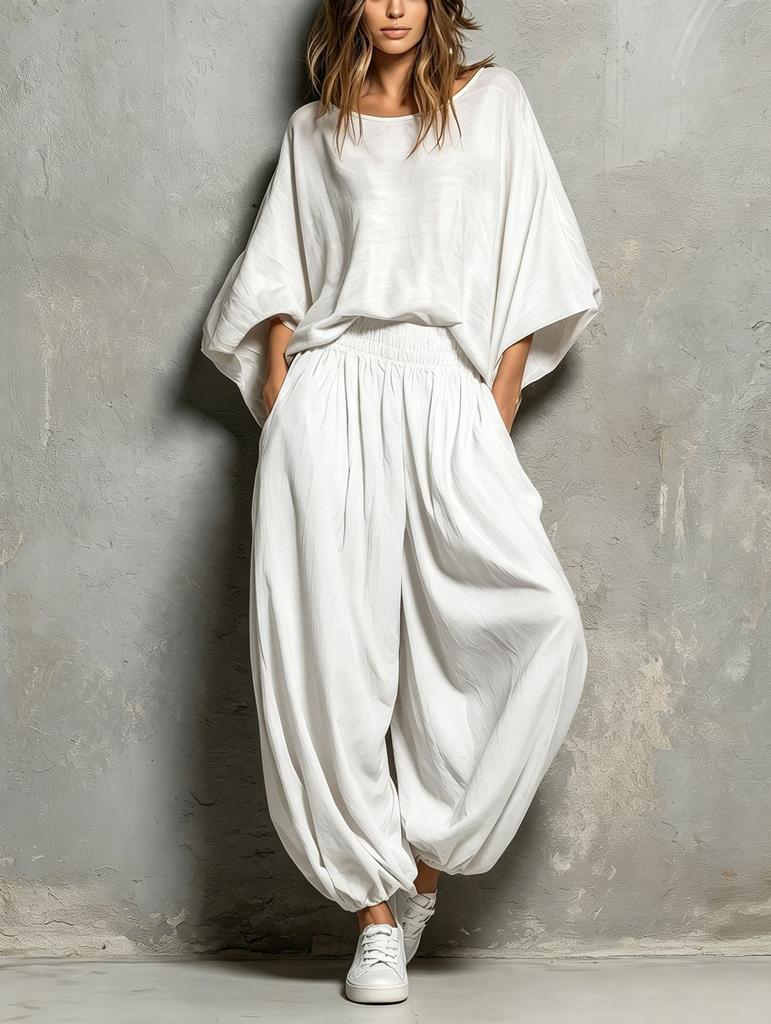 European and American women's clothing 2026 autumn and winter new fashion casual round neck loose top wide leg pants two-piece set