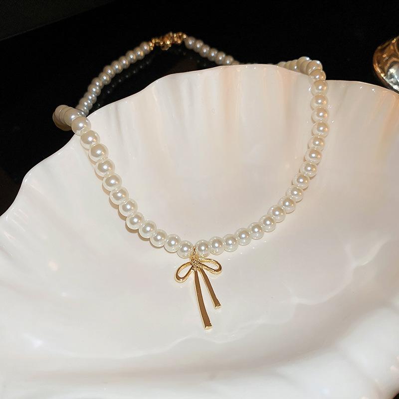 Simple long pearl necklace fashion ins design sense collarbone chain Y type personality temperament versatile item decoration