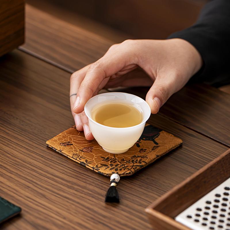 Elegant Chinese Tassel-Fabric Coaster: Waterproof, Anti-Slip, Double-Sided Tea Table Accessory