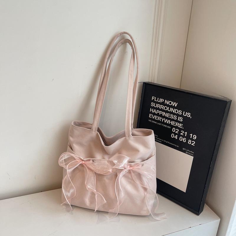 Korean version of fashionable large-capacity underarm commuter bag women's bag 2025 new bow tote bag shoulder bag