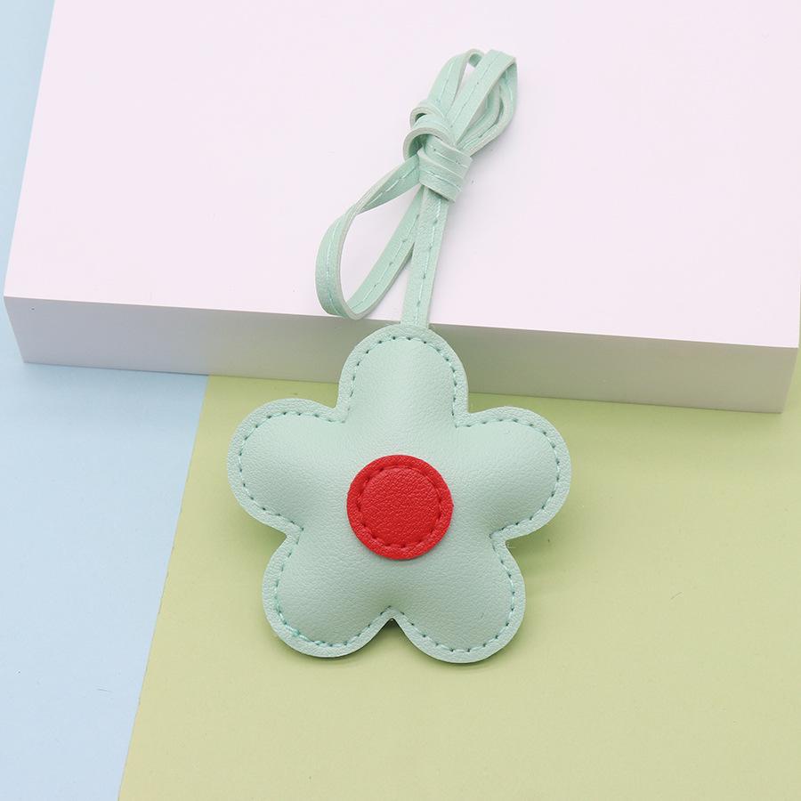 

Маленький кожаный кулон в форме цветка, подвеска-украшение для сумки One Size зелёный