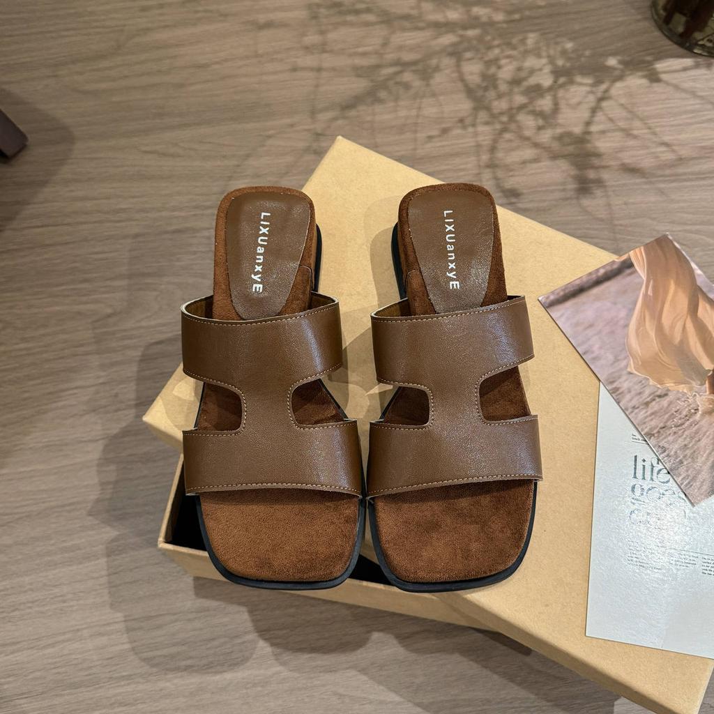 Retro versatile one-word slippers women's 2025 summer new outer wear retro flat bottom heightening sandals simple sandals tide