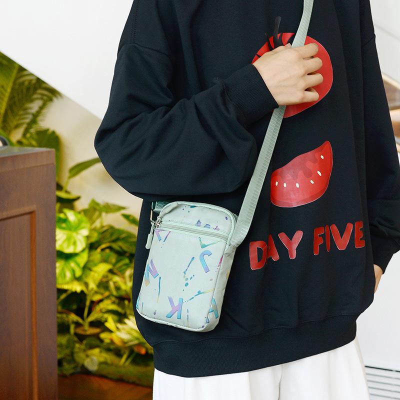 Fashion Hot Stamping Letters New Shoulder Bag Female Lightweight Joker Korean Version of The Messenger Bag Portable Commuter Mobile Phone Small Bag.