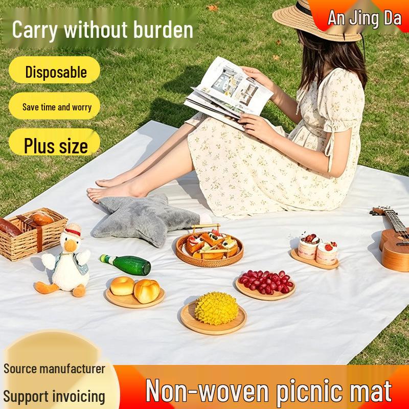 Waterproof, Stain-Resistant Outdoor Picnic Mat - Thick and Moisture-Proof for Beach, Lawn, or Campsite Use.