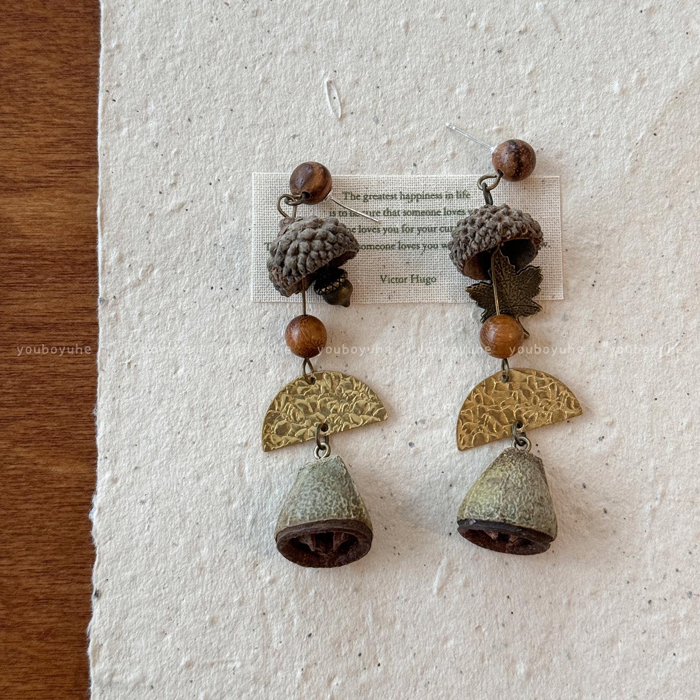 

Chinese Retro Mori Style Eucalyptus Fruit Dangle Earrings - Unique Niche Design for Women