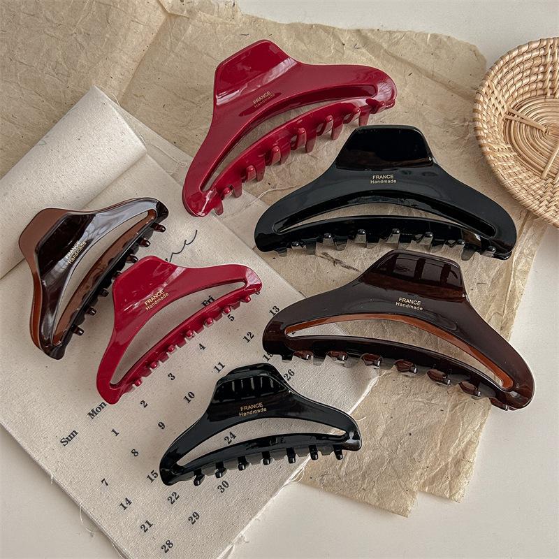Gold-Labeled Acetate Dumpling Claw Clip Hair Accessory