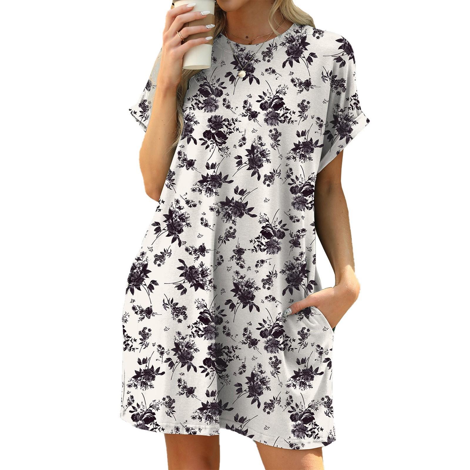 

Женское модное платье свободного кроя с цветочным принтом и круглым вырезом, короткими рукавами и карманами L чёрный