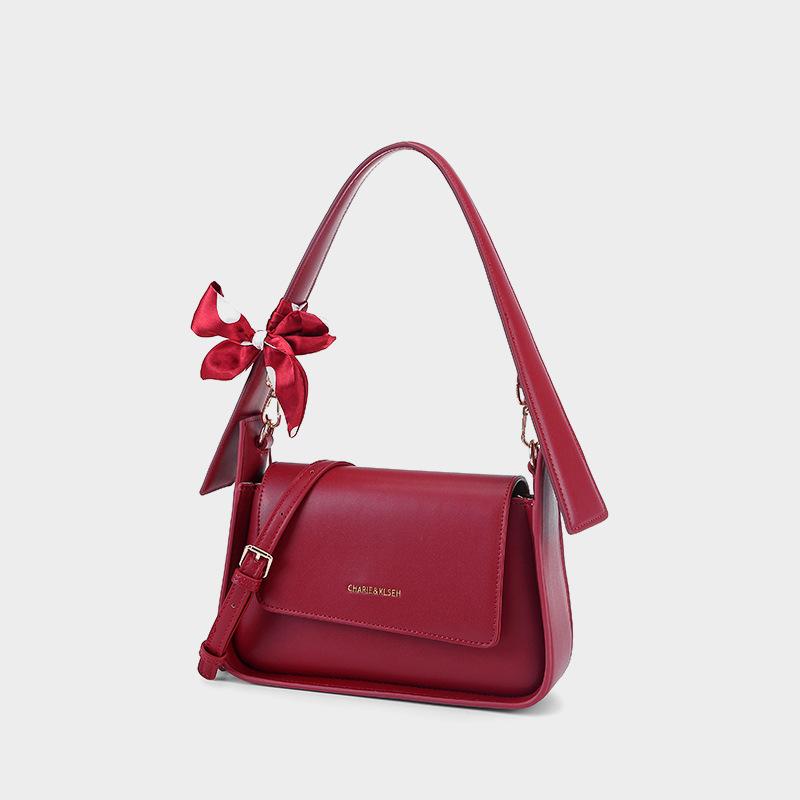 The Red Bag Is A Women's Underarm Bag and A Bride's Wedding Bag. It Can Be Used Daily As A Crossbody Handbag