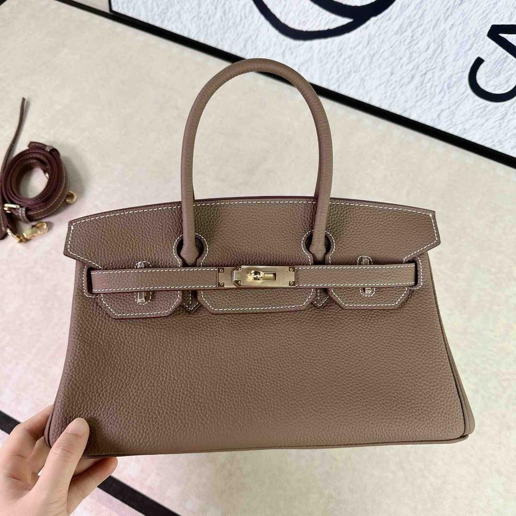 New French Stick Bag Lychee Pattern Horizontal Platinum Baotou Layer Leather Handheld Underarm Bag Genuine Leather Women's Bag