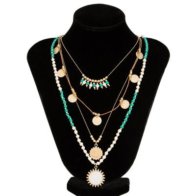 Collana Stratificata con Ciondolo a Sole in Metallo di Ispirazione Etnica Catena Clavicolare con Perline Colorate Accessorio Per Uso Casual o Formale