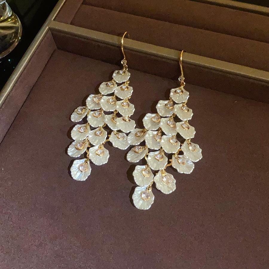 

European and American zircon shell fringed ear hook exaggerated simple fashion earrings women s personality earrings design sense niche