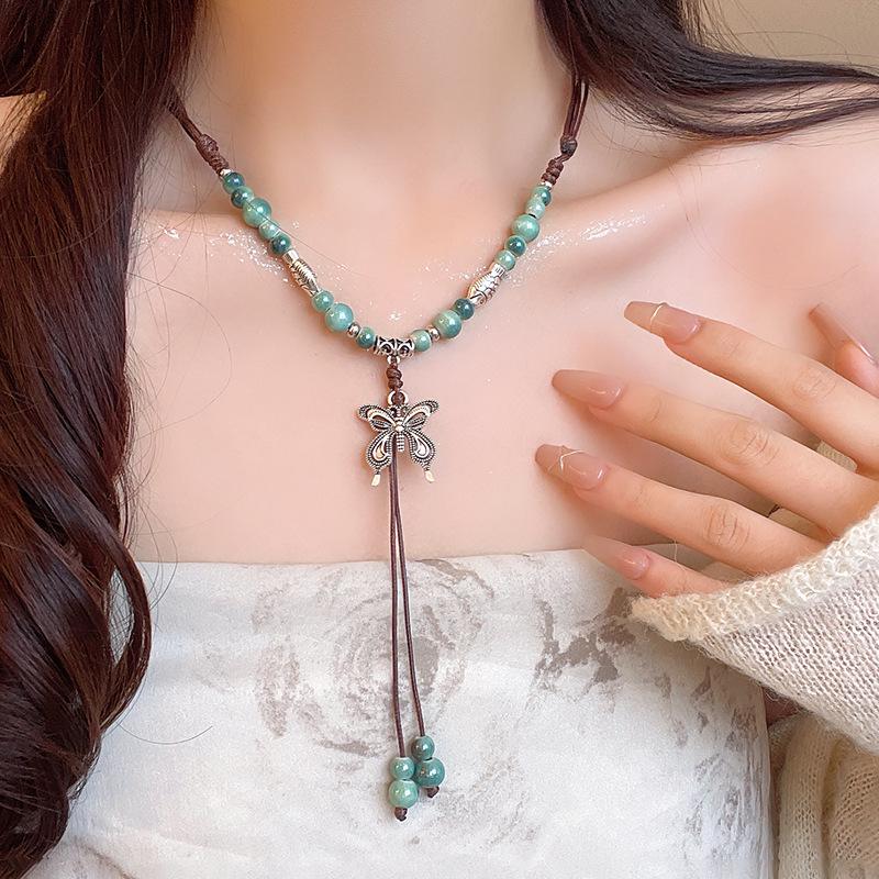 Women's Zen Retro Feather Necklace - Ethnic Layered Beaded Clavicle Chain, Long Bohemian Style