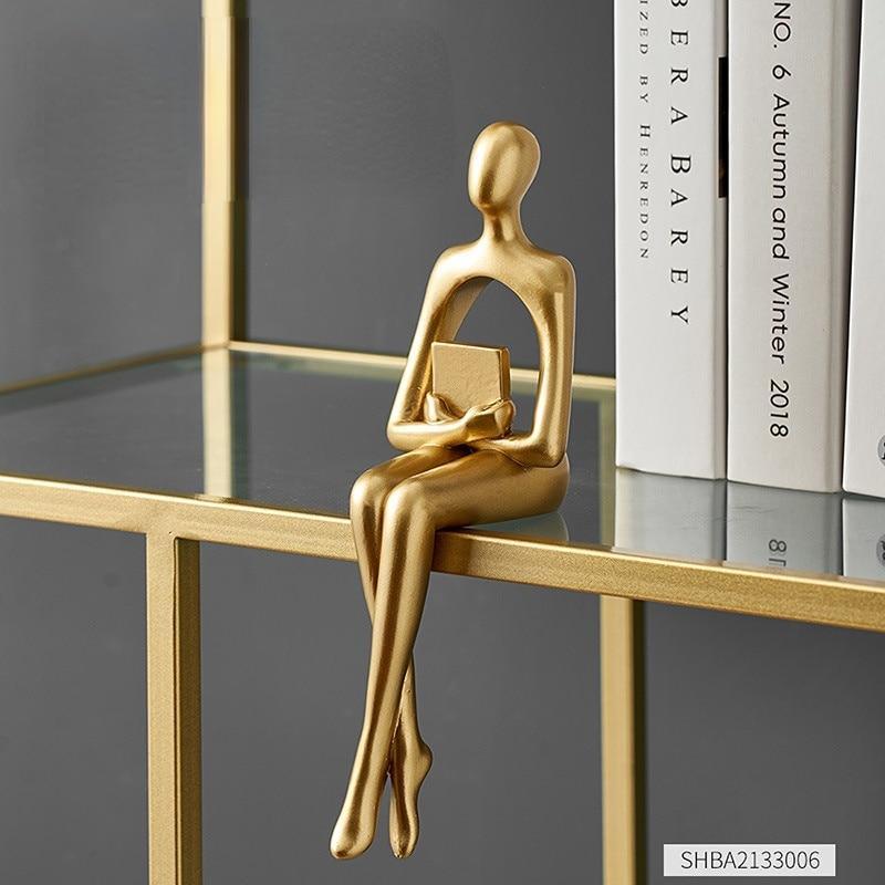 Heimdekoration, Bücherregal, Dekoration, Zubehör, abstrakte Harzstatue, goldene Miniaturen, modern