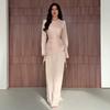  autumn new European and American Amazon cross-border round neck irregular long-sleeved top fishtail skirt set