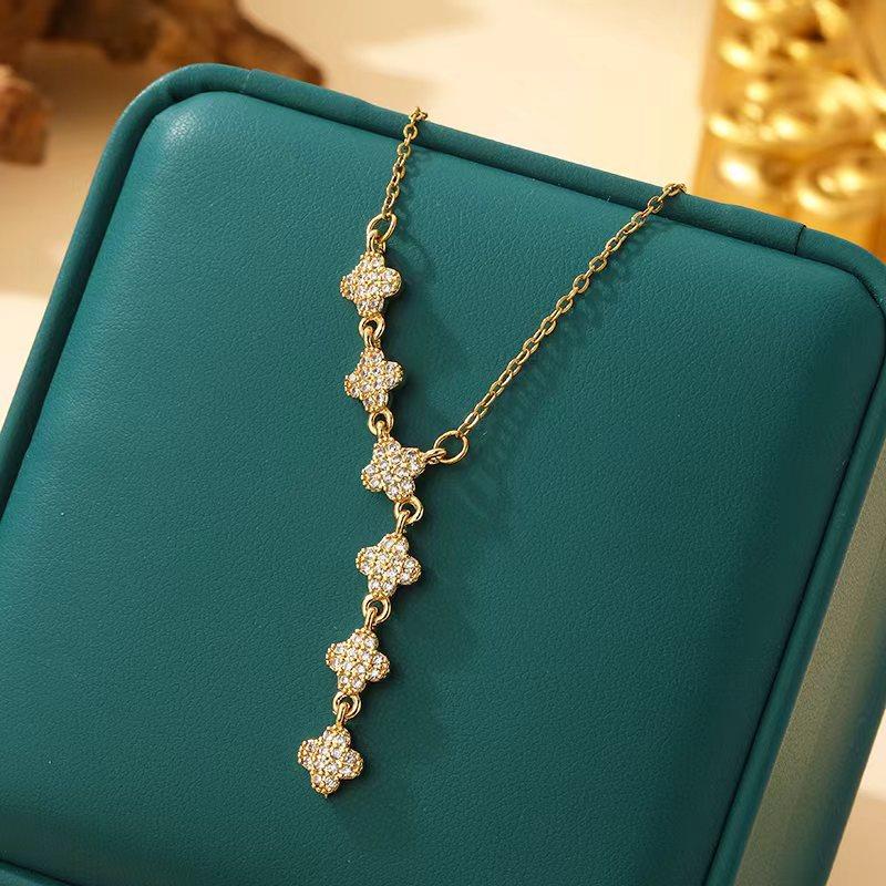 

Exquisite Sparkling Light Luxury Pendant Necklace With Tassel And Four-Leaf Clover Design Micro-Set Full Diamond Flower Collarbone Chain For Women