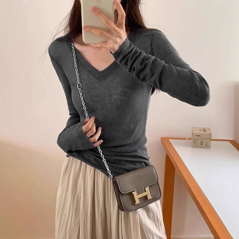 Unique and beautiful v-neck tulle slightly transparent knitted sweater women's early spring new slim-fit sunscreen blouse pink bottoming top