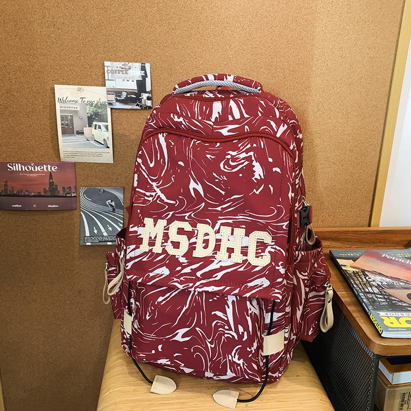 High school backpack boys ins trendy cool personality graffiti college student schoolbag women s casual simple versatile backpack красный