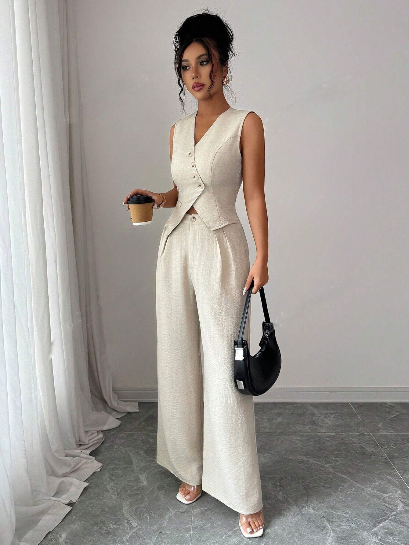 

Жіночий костюм: жилет з дизайном-краваткою та штани прямого крою Small абрикосовий