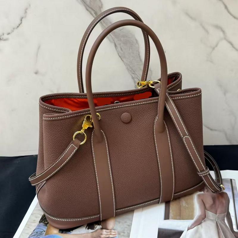 2025 New Style Genuine Leather Womens Bag Top Layer Cowhide 30 Flower Garden Bag Solid Color Cowhide Waxed Canvas Strap Handbag Single Compartment Bag