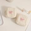 Compact Multi-Use Storage Bag: Sanitary Pads, Lipstick, Earphones, Coins, and Miscellaneous Items