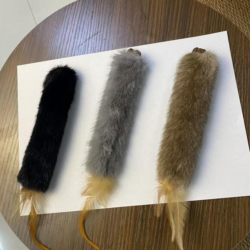 Faux Mink Fur Cat Enrichment Sniffing Toy - Durable Feather Teaser Stick for Self-Entertainment and Hunting.