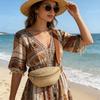 One ladies' straw waist bag with adjustable shoulder strap for crossbody wear, suitable for summer beach vacations and daily use