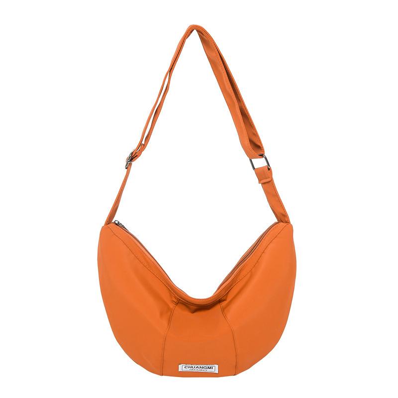 

Wholesale high-quality casual simple nylon dumpling bag lightweight and versatile couple with the same sports style messenger bag оранжевый