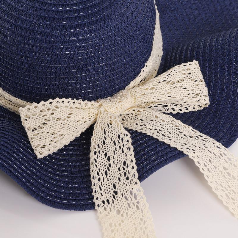 Summer wavy edge bow streamer straw hat seaside outing idyllic sunshade sun protection UV protection sun hat