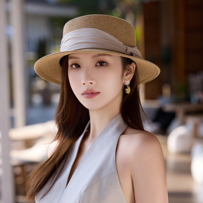 Taizhou Wenling hat women's summer French Hepburn style elegant straw straw hat seaside beach sunshade sunscreen hat