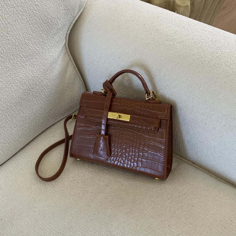 Hand-held small bag women's versatile 2025 new autumn and winter fashion texture cross-body small bag high-end shoulder bag